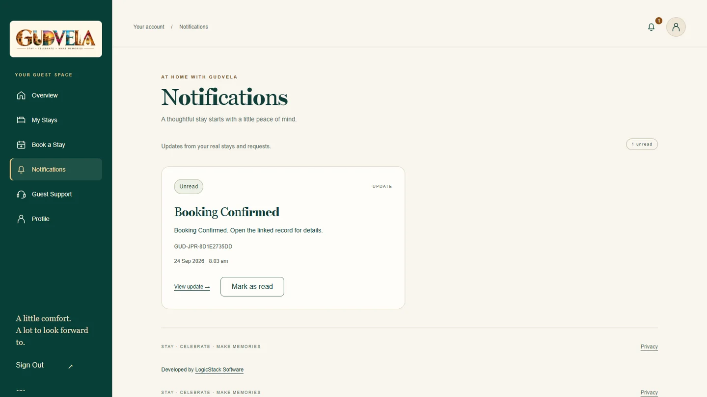 GUDVELA Notifications screen with an unread Booking Confirmed update, View update and Mark as read controls